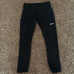 Nike leggings with zipper and mesh on the calves